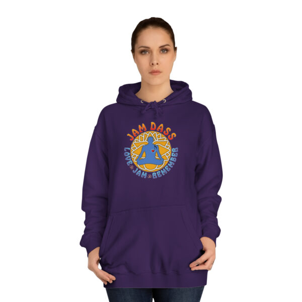 A woman wearing a purple hoodie with an image of a person in the middle.
